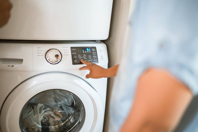 Tenant using a washing machine